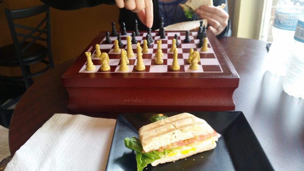 Playing chess over some lunch