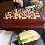 Playing chess over some lunch