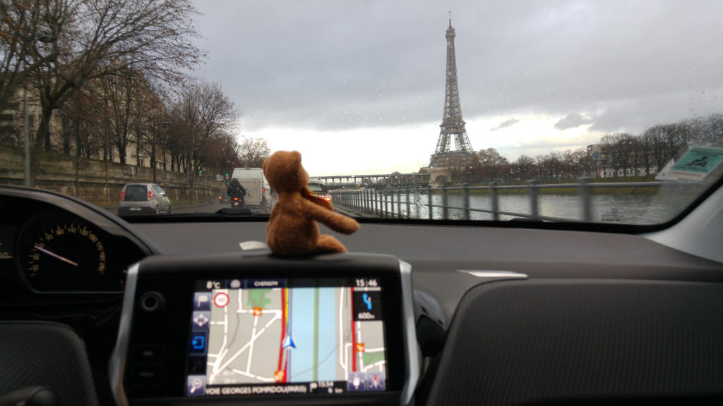 Flint driving near Eiffel Tower